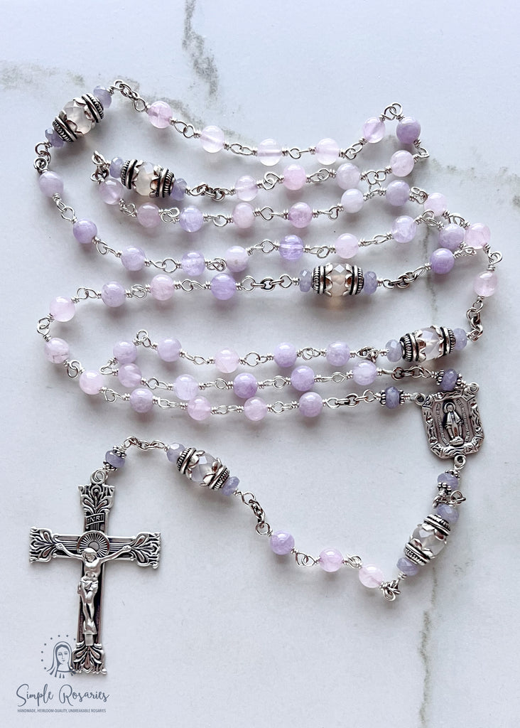 Handmade, heirloom-quality rosary featuring unbreakable Cape Amethyst beads and durable solid sterling silver construction, designed for lasting beauty and spiritual significance