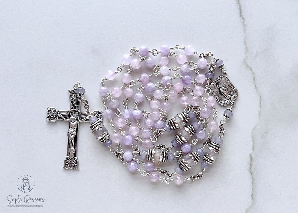Handmade, heirloom-quality rosary featuring unbreakable Cape Amethyst beads and durable solid sterling silver construction, designed for lasting beauty and spiritual significance