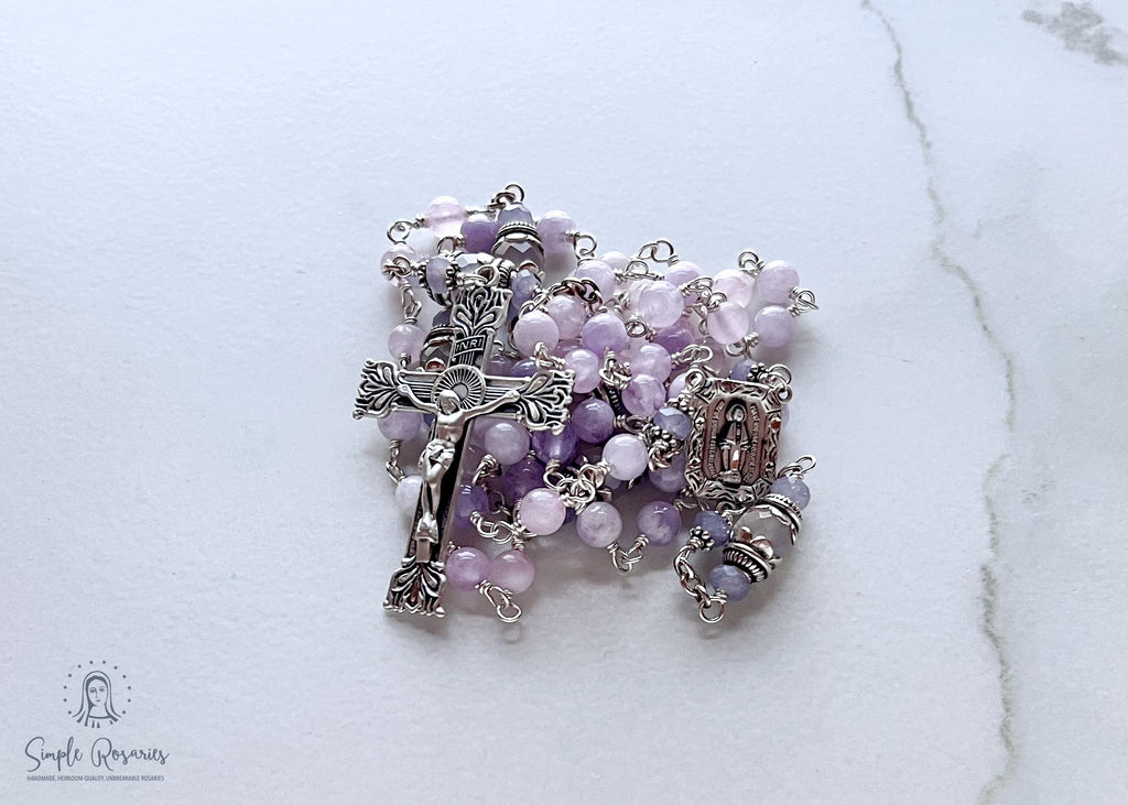Handmade, heirloom-quality rosary featuring unbreakable Cape Amethyst beads and durable solid sterling silver construction, designed for lasting beauty and spiritual significance