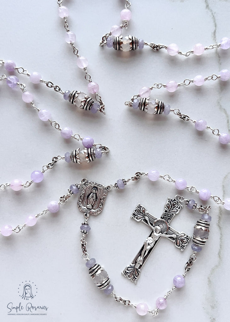 Handmade, heirloom-quality rosary featuring unbreakable Cape Amethyst beads and durable solid sterling silver construction, designed for lasting beauty and spiritual significance
