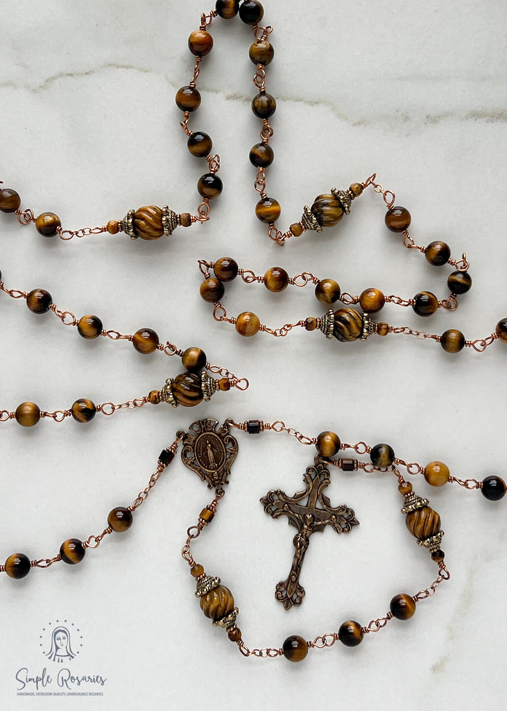 handmade, heirloom-quality, unbreakable tiger eye rosary, carved pater beads, solid bronze construction, centerpiece and crucifix, brown and black beads