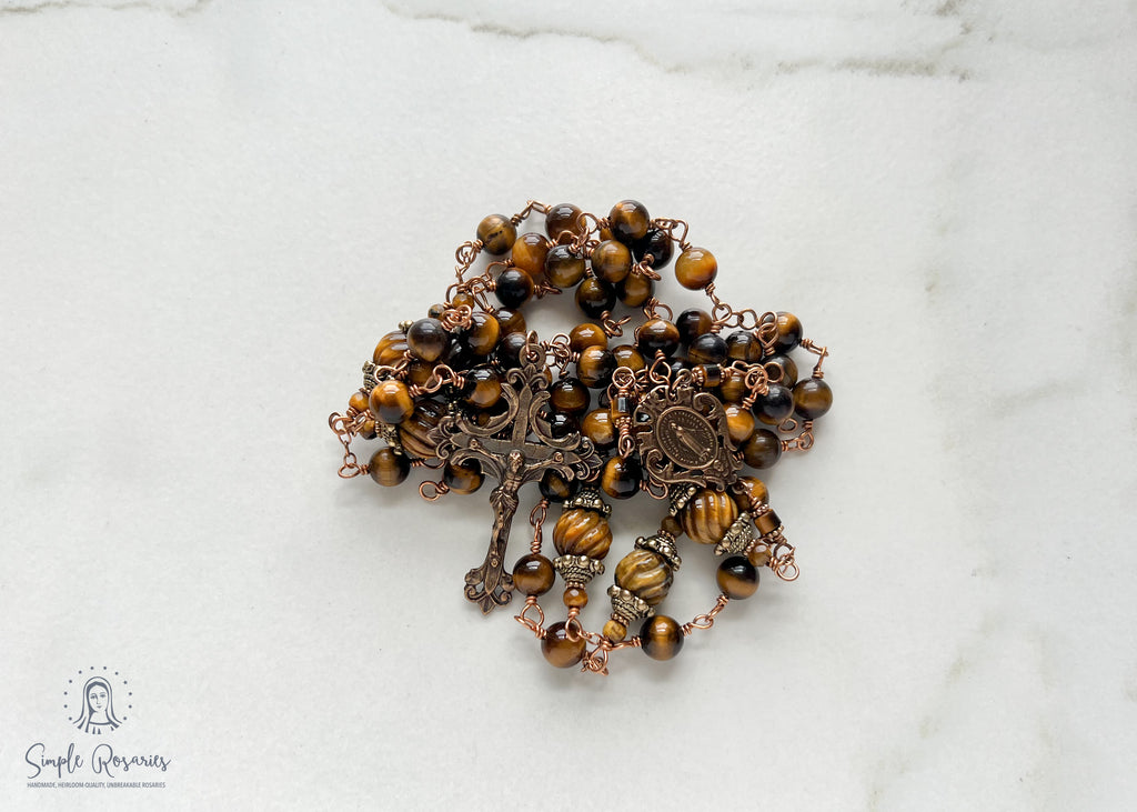 handmade, heirloom-quality, unbreakable tiger eye rosary, carved pater beads, solid bronze construction, centerpiece and crucifix, brown and black beads