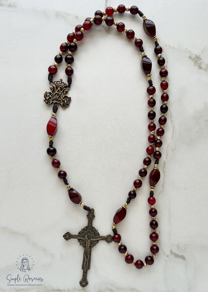 handmade heirloom quality cord rosary solid bronze and red horn construction