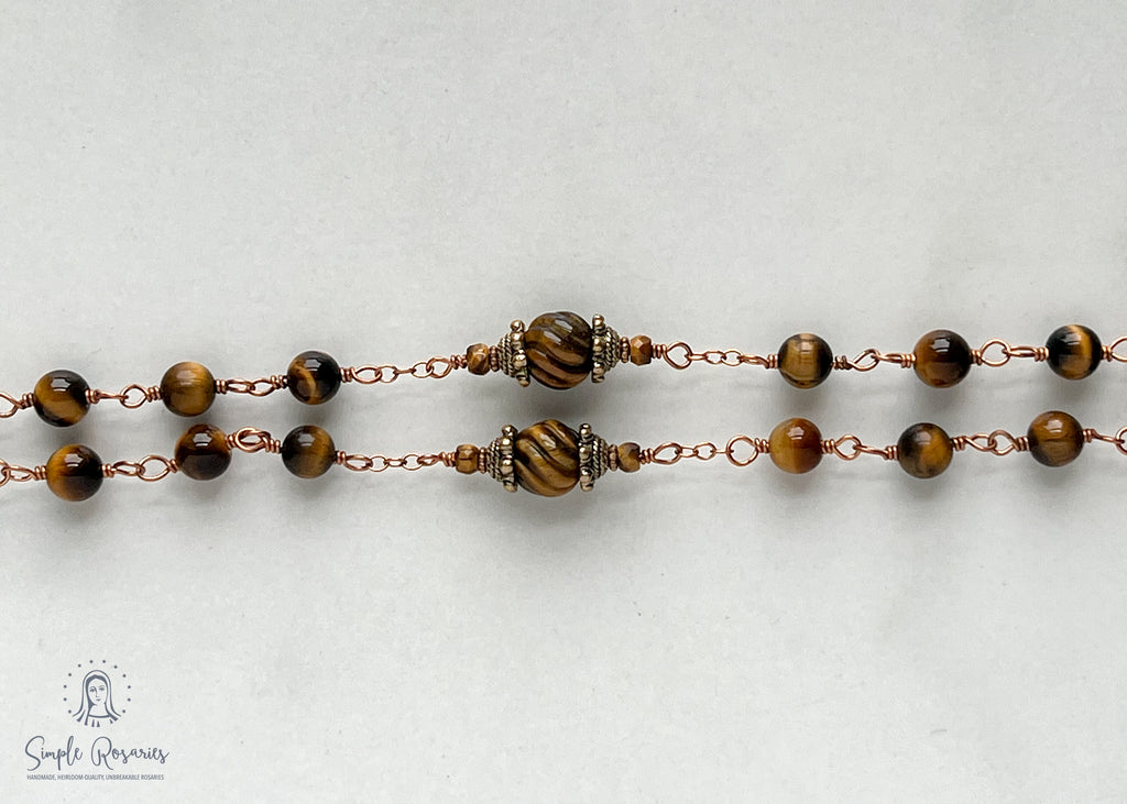 handmade, heirloom-quality, unbreakable tiger eye rosary, carved pater beads, solid bronze construction, centerpiece and crucifix, brown and black beads
