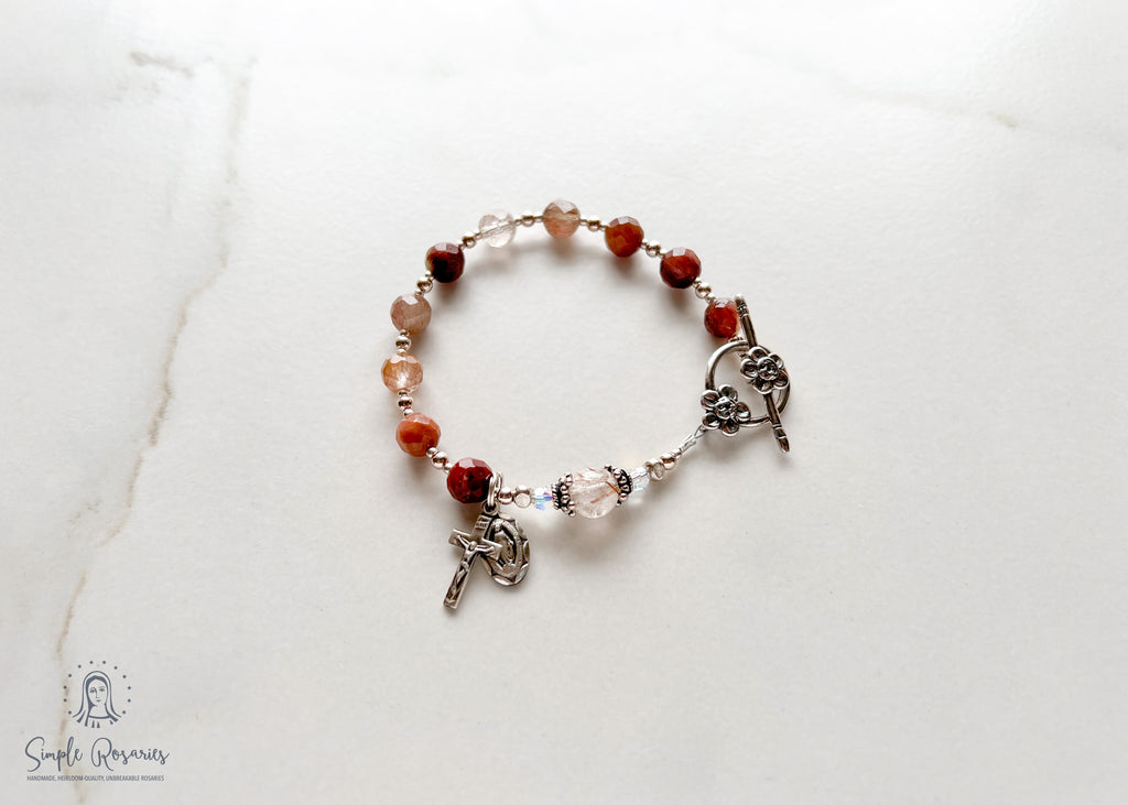 handmade, heirloom quality quartz rosary bracelet, solid sterling silver components, Swarovski crystal, crucifix, and miraculous medal